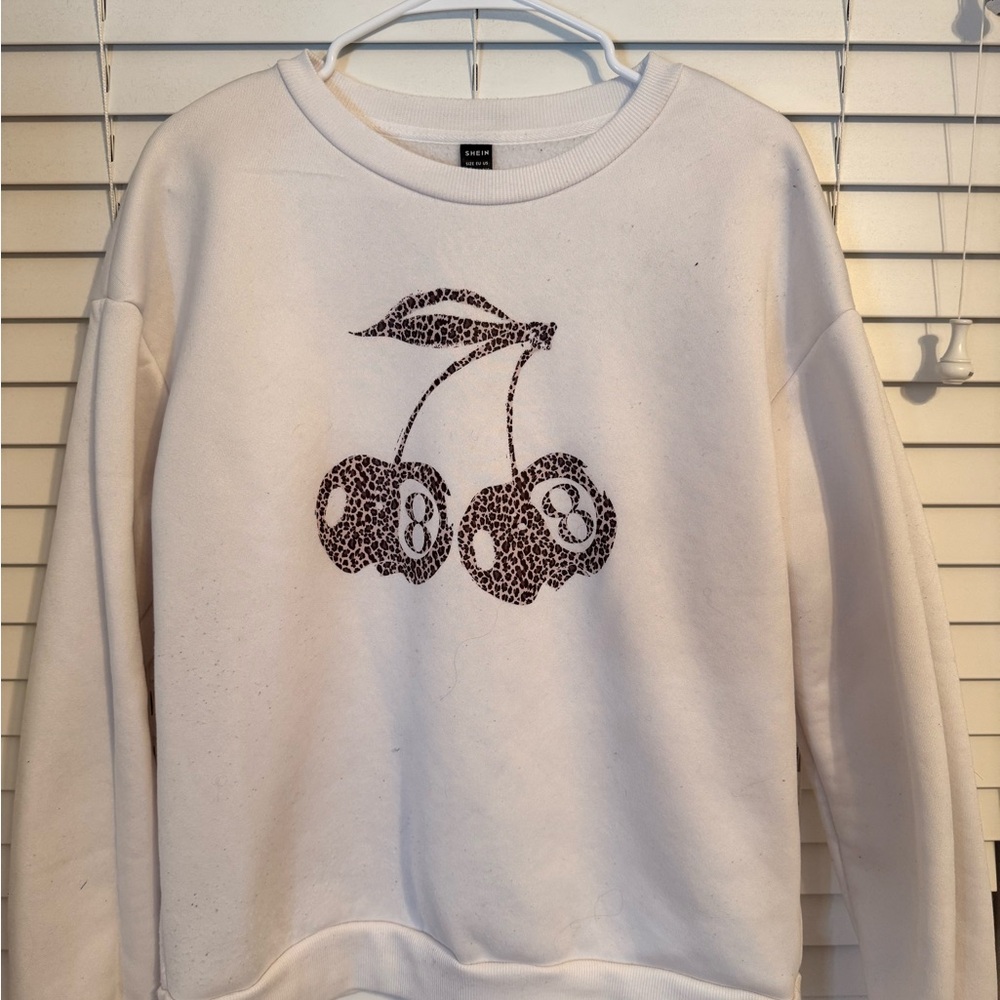 SHEIN White Sweater with Leopard Cherry Design
